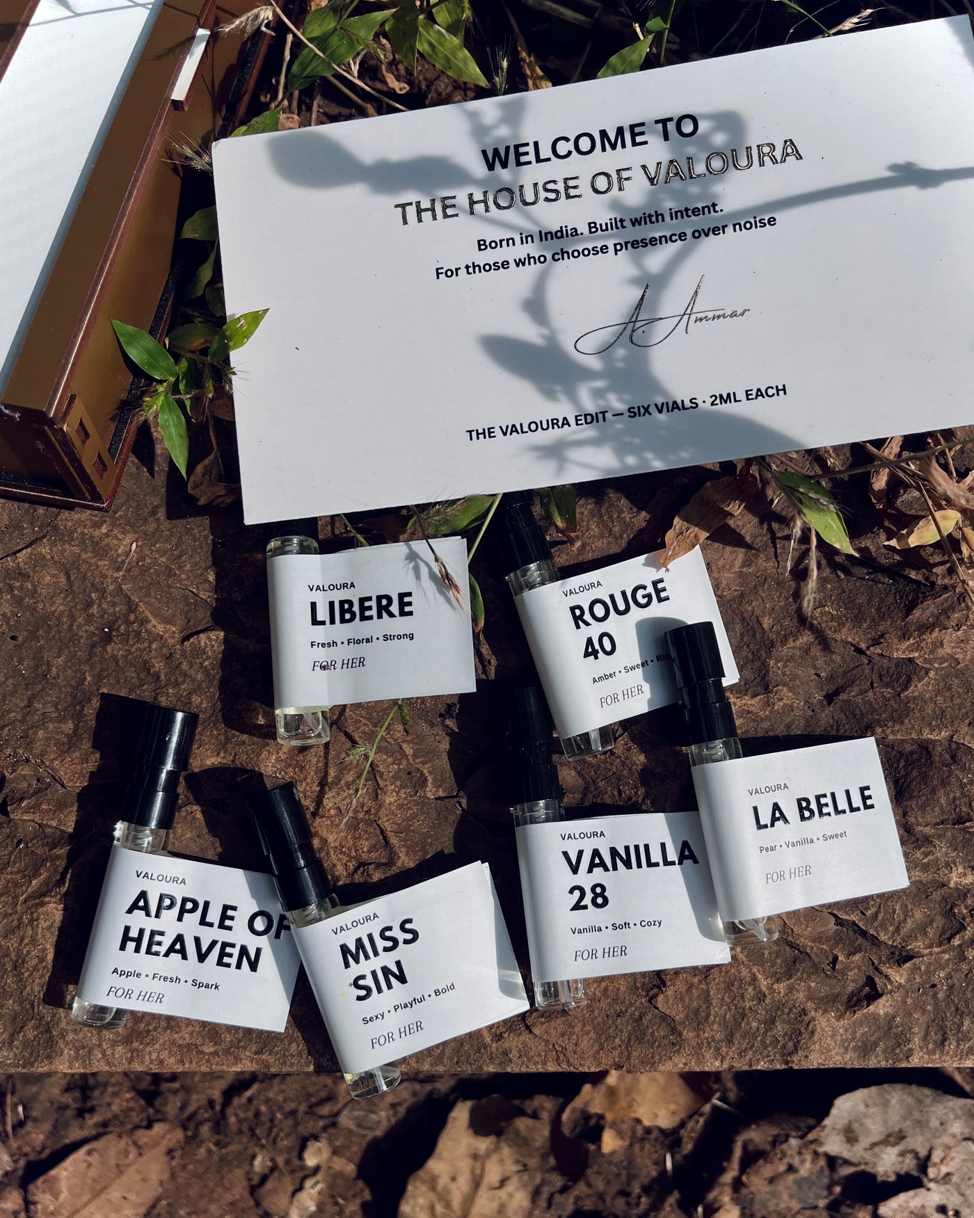 Valoura Edit For Her box and vials photographed in outdoor setting