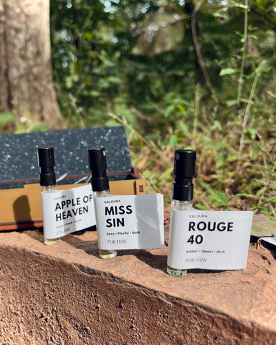 Valoura Edit For Her box and vials photographed in outdoor setting
