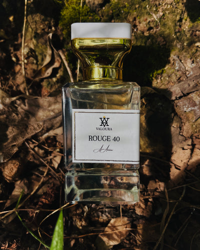 Perfume bottle labeled 'Rouge 40' by Valoura on a natural background