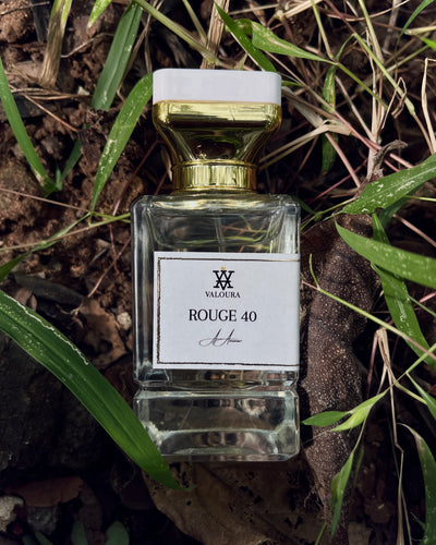 Perfume bottle labeled 'Rouge 40' by Valoura on a natural background